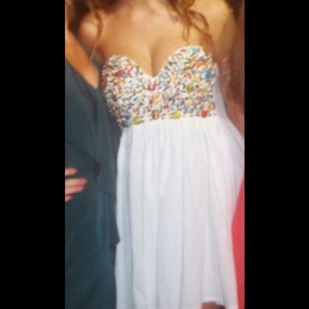 Super cute dress with beading.